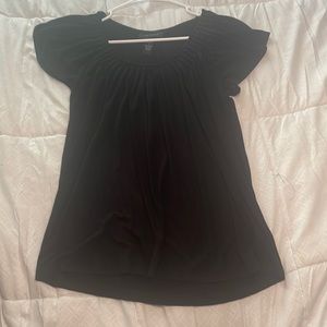 Black shirt with ruffled neckline